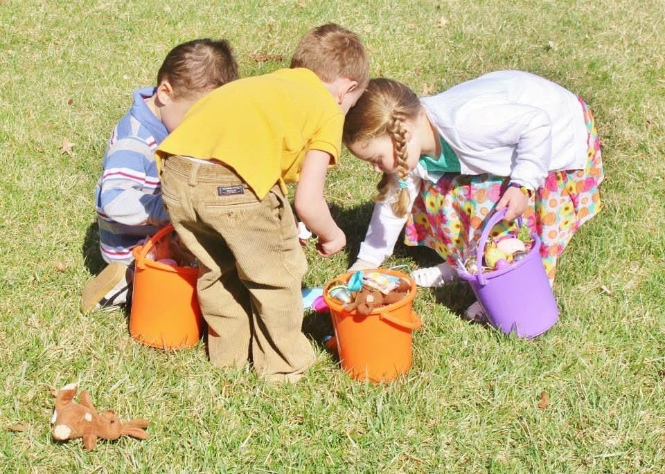 Kids checking Easter baskets at Kiddie Care preschool