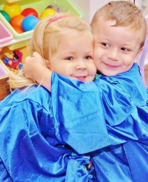 Little graduate celebrating at Kiddie Care home daycare